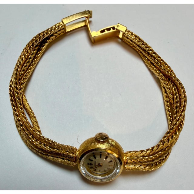 Metal Corum. A lady's 18K gold Multiple Chain bracelet watch 38.5 Gm, 7.25 " Vintage For Sale - Image 7 of 18