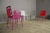 From the name of the capital of French Polynesia, these 6 chairs, two reds, two fuchsia, one gray and one white, are...