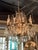 This 19th century French Louis XV bronze and crystal chandelier is a stunning piece perfect for lighting up any room. With...