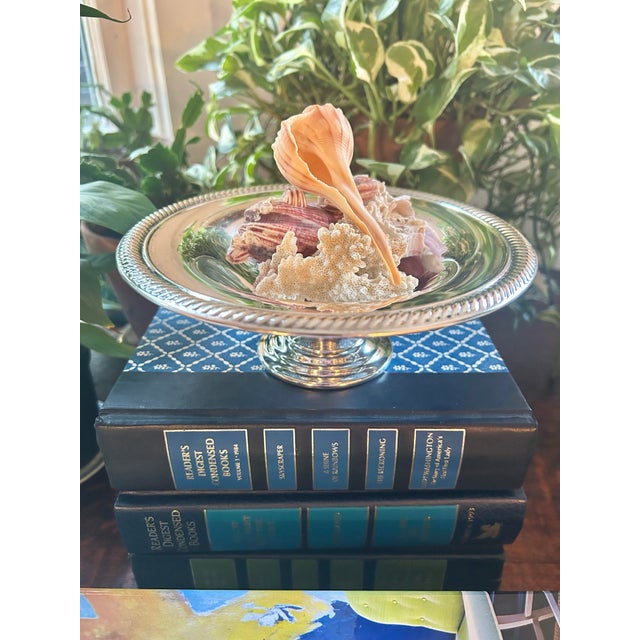 Silver pieces are such an old world way to add elegance to your home. This silver plate pedestal dish is from Wm Rogers...