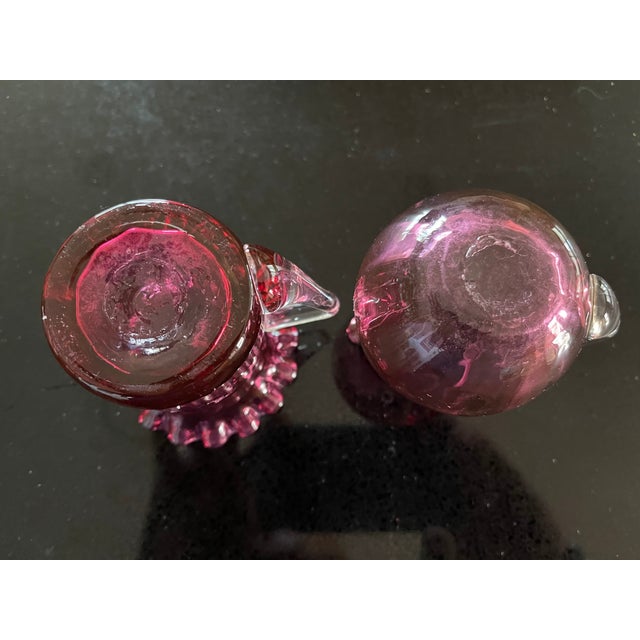 These vintage pair of blown glass with pontals on the bottom are handmade in the USA. Known for their cranberry glass,...