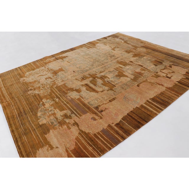 This 9x12 contemporary floral rug, hand-knotted in wool and natural silk, reimagines classic decorative motifs through an...
