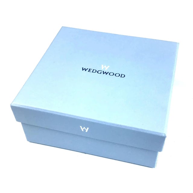 New and gift boxed set of Salt & Pepper shakers by Wedgwood. The top of each shaker is adorned with the trademark Black...