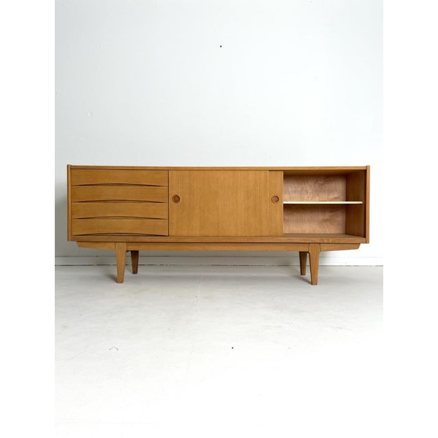 Erik wørts – oak veneered sideboard, ikea, 1960s a clean-lined and timeless oak veneered sideboard designed by erik wørts...