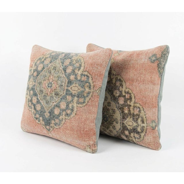 This beautiful 24'' x 24'' pillow cover set was made from authentic Turkish rug pieces. Bright colors of wool adorn the...