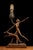 c. 1930s; S. C. Tarrant Co. Inc. - New York Vintage bronze statuary lamp. This piece features a large figural statuette...