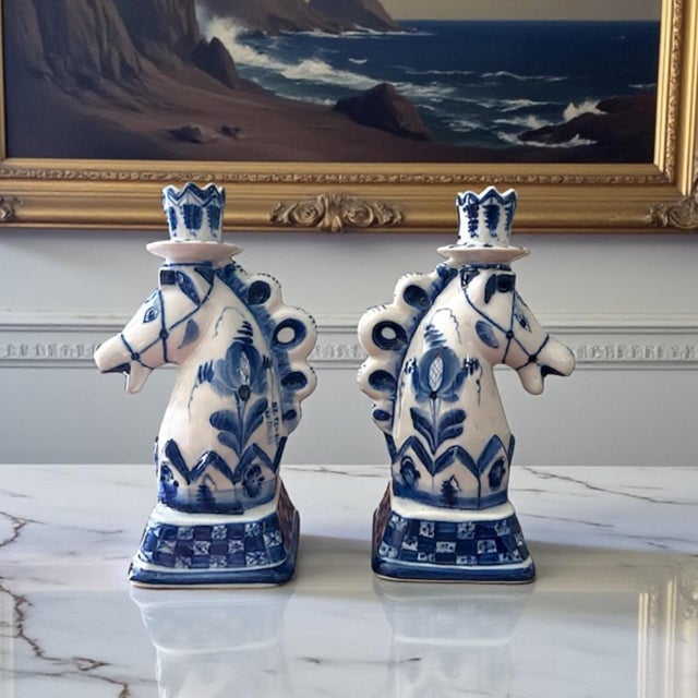 A charming and highly decorative pair of vintage Russian ceramic candlesticks, crafted in the classic Gzhel blue-and-white...