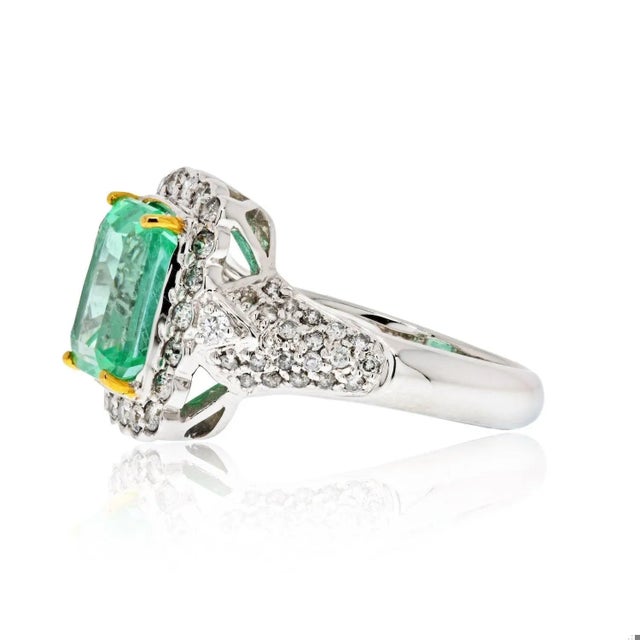 Art Deco-inspired Colombian Emerald ring of 3.58 carats. Gold carat stamped on the inside of the ring setting. Emerald is...