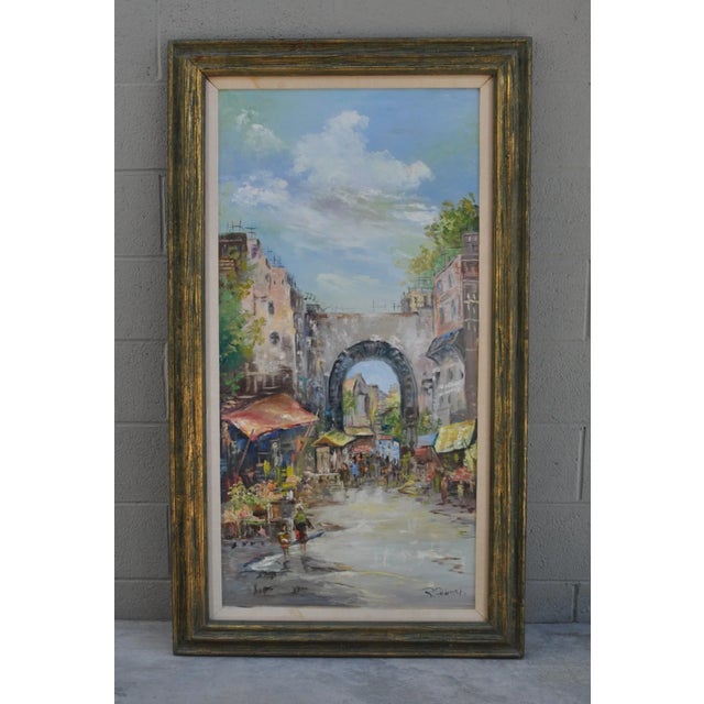 A large, signed, original oil painting by California artist Ruby Dobesh (1905-2003). A romanticized street scene of her...