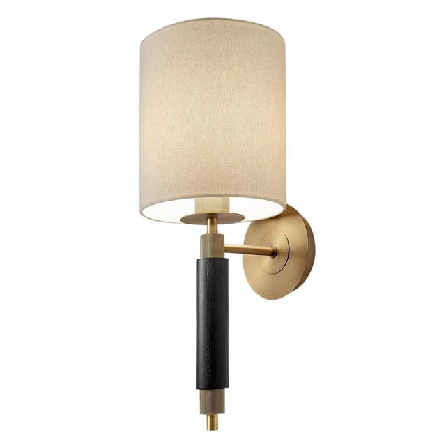 Chunky Ebony Stained Wooden Sections Combine With Reeded Tubing To Feature In This Elegant Guestroom Lighting Design.