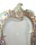 An exquisite late-19th-century French dressing-table mirror, finely crafted in gilt bronze and brass with elaborate...