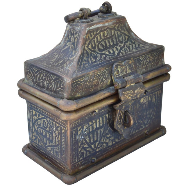 Impressive antique extremely heavy Moroccan keepsake accent exceptionally handcrafted of solid brass. Exhibiting intricate...