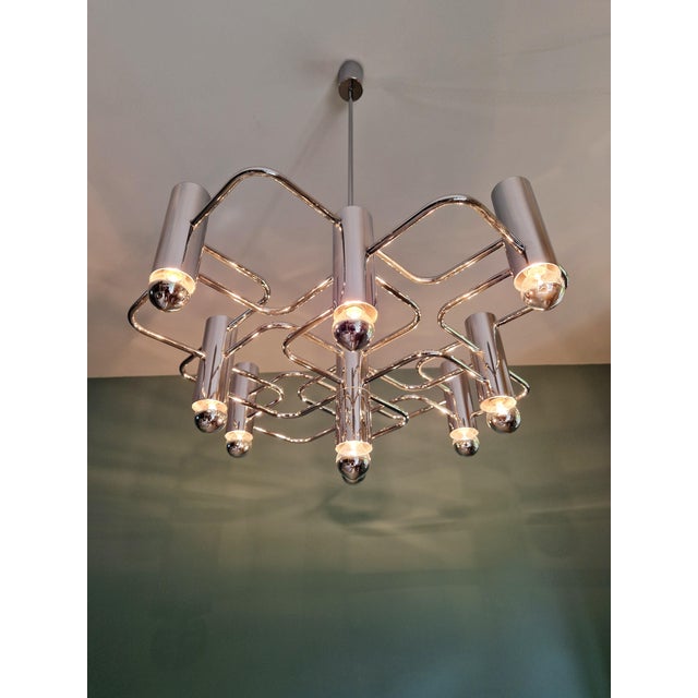 Large chrome-plated metal chandelier, designed by gaetano sciolari for the belgian manufacturer boulanger, 1970s. this...