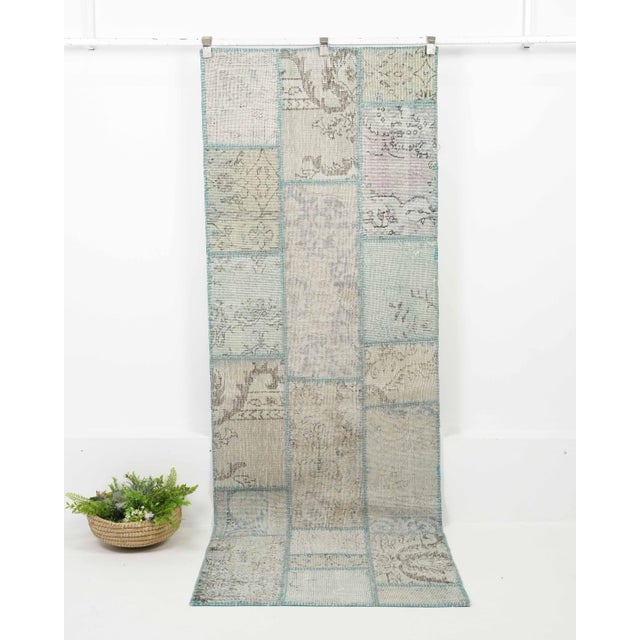 Vintage Turkish Hand-Knotted Patchwork Runner rug is a semi-antique vintage runner rug. The '70s Eastern region of...