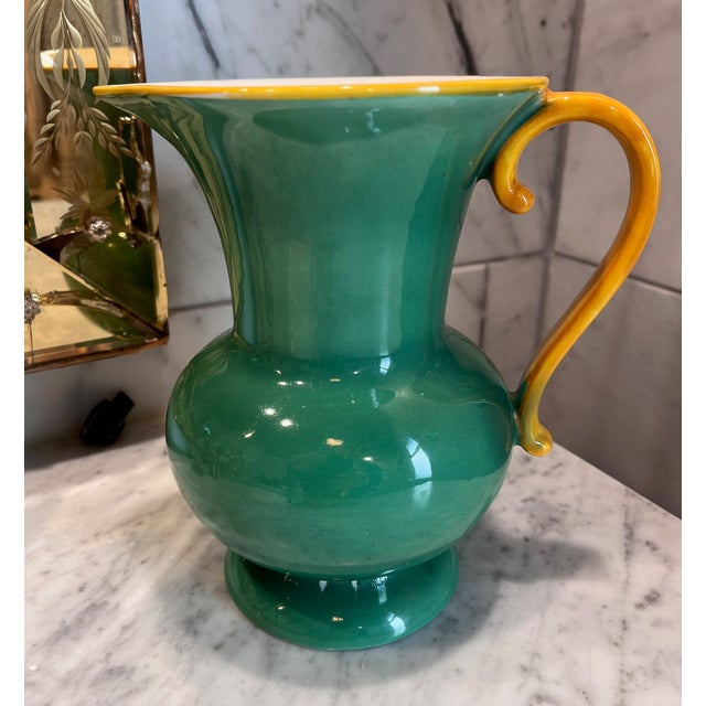 Vibrant green and yellow Czech pitcher with graceful handle. Marked 1QR Lostro.