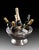 Handcrafted in Italy, this pewter wine cooler holds up to six bottles of wine or champagne in individual compartments to...