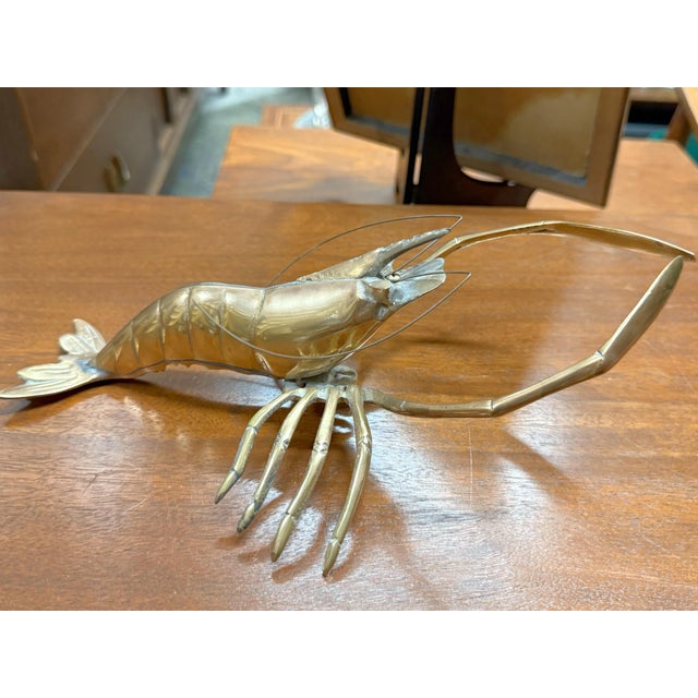 Midcentury brass lobster, circa 1950s. This can be hung on the wall or placed on a surface. Very detailed.