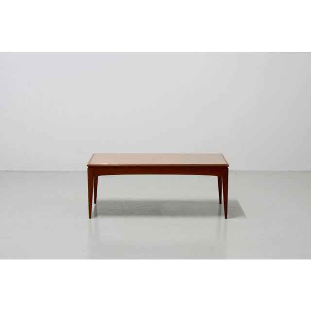 This coffee table is made from teak and was designed by Richard Hornby. His elegantly crafted furniture was manufactured...