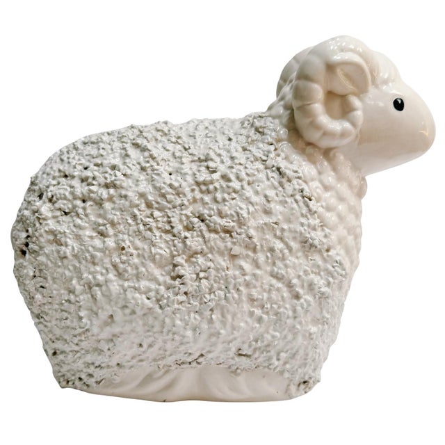 An adorable vintage white ceramic ram figurine perfect for both indoor and outdoor decor. Popcorn textured wool body,...