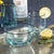 A striking addition to any glassware collection, this 4-piece tumbler set features a mesmerizing swirl design that adds a...