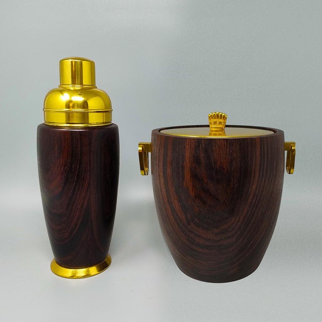 1970s gorgeous cocktail shaker with ice bucket in walnut wood and brass by aldo tura for macabo. Made in italy. The items...