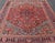 Brilliant Antique Heriz Rug with Central Medallion and Geometric Design. Made in the early 20th century in Iran, this...