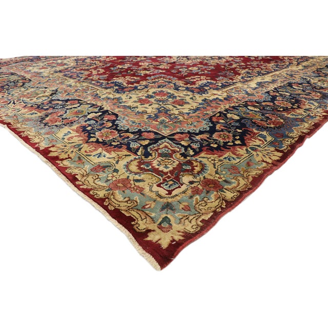 73735 Vintage Persian Yazd Rug, 09'08 x 14'01. With an impressive array of realistic floral elements and brilliant,...