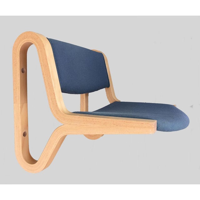 Wall-mounted one seat benches in beech and original blue fabric by Rud Thygesen and Johnny Sørensen manufactored by Magnus...