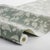 A romantic revival of a 1920s design from the Boråstapeter archive, Syren features a graceful repeat of stylized lilac...