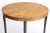 Bleached rosewood mid century circular table with ebonized wood legs may be used as dining table or games table. USA, c....