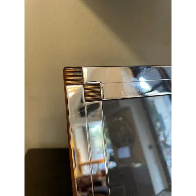 1970s Steel Frame with Brass Inserts Elegant vintage frame featuring a steel border enhanced with brass details. The back...