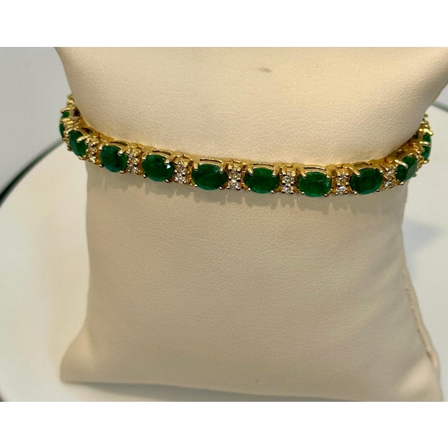 This exceptionally affordable Tennis bracelet has 20 stones of oval Emeralds . Each Emerald is spaced by two diamonds ....