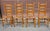 A Set of Four Shaker Style Maple Ladder Back with Rush Seats Dining Chairs Measure 17: in width, 17" in depth and 42" in...