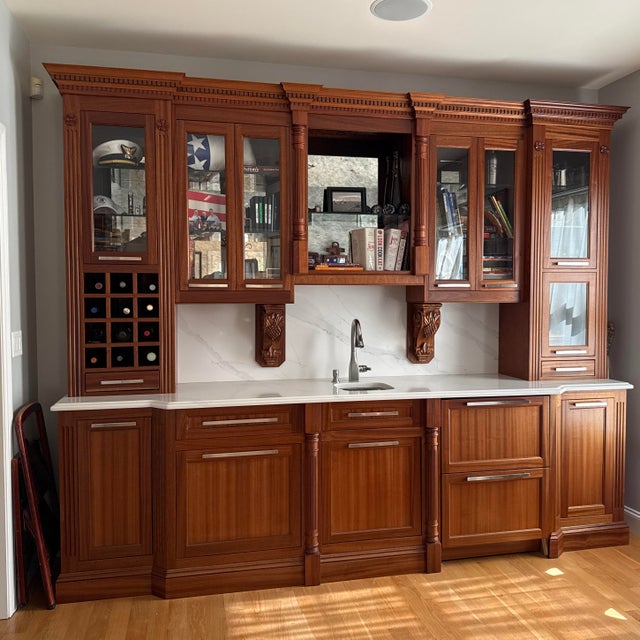 This beautiful hand carved mahogany wet bar would be perfect addition to a basement bar or entertaining space. It was $50k...