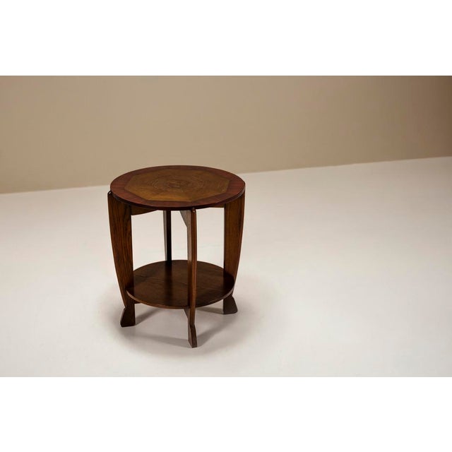 Design that moves quietly often resonates the longest. This Dutch Art Deco side table, model 258 by P.E.L. Izeren, was...