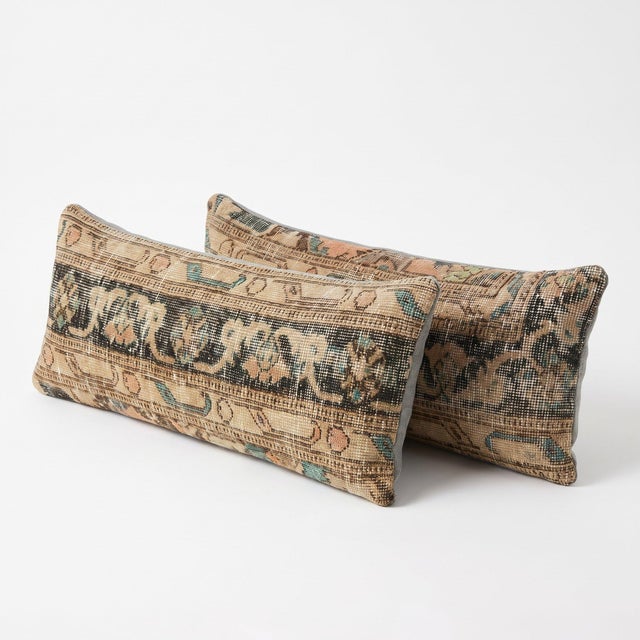 This 12'' x 36'' & 12'' x 35'' pillow cover set was made from authentic Turkish rug pieces — faded Oushak vine border...