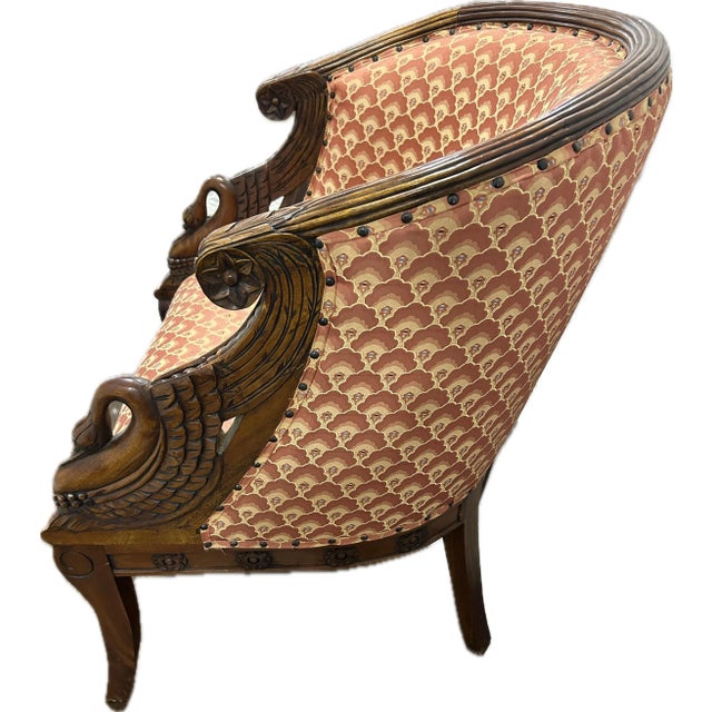 This beautiful rare carved wood swan chair, is a statement piece. Comfortable and elegant.