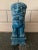 A striking vintage Chinese guardian lion, commonly known as a foo dog, crafted in glazed ceramic with a rich variegated...