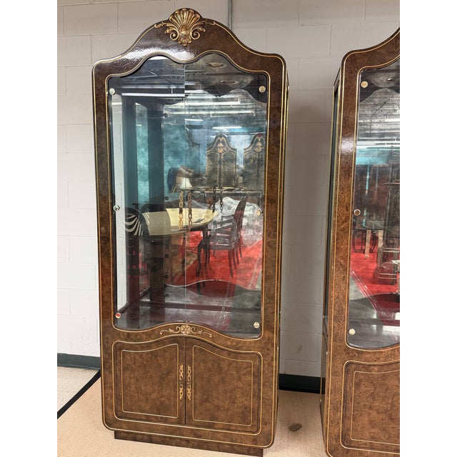 Extraordinary Pair of Mastercraft Carpathian Elm Vitrines. Magnificent condition acquired from the original owner....