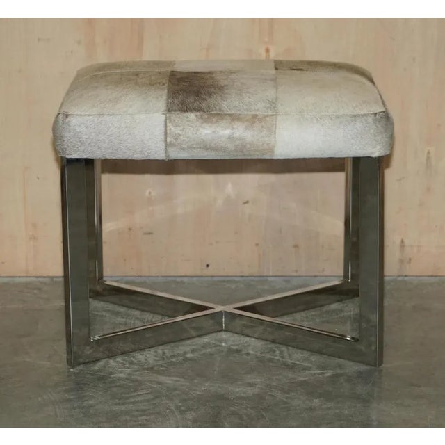 This is a lovely oak and Pony hide trestle stool for desks or dressing tables. This is a very good looking well made and...