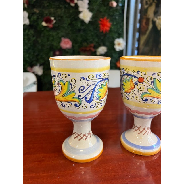 Up for consideration is a beautiful vintage pair of Italian style ceramic pedestal cups. These would look lovely in your...