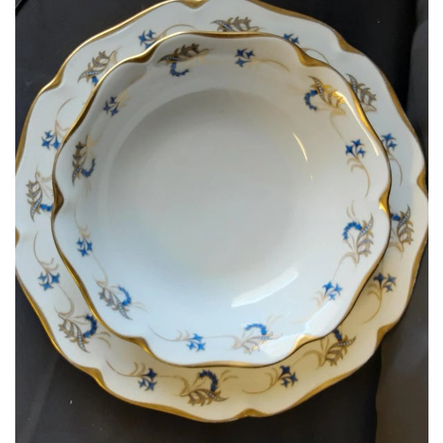Elegant vintage KPM large serving bowl and platter with hand painted gold trim and blue and gold design. Porcelain the...