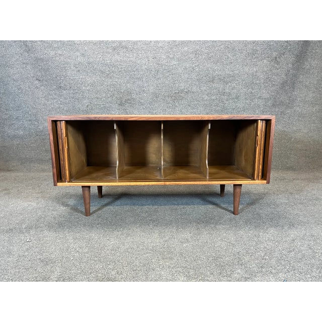 Mid-Century Modern Low Credenza designed by Milo Baughman for Glenn of California in the United States circa 1950s. This...