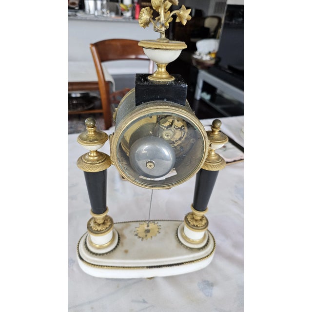Late 18th Century Louis XVI Ormolu-Mounted Black and White Marble Mantel Clock by Rouviere For Sale - Image 9 of 12