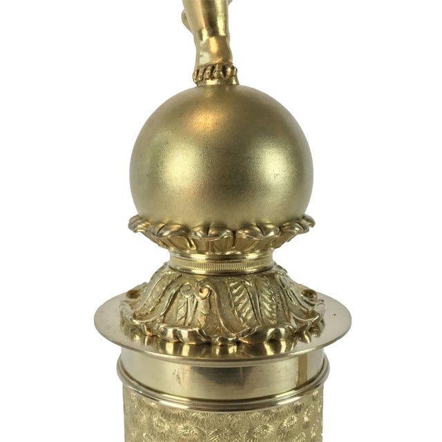A pair of French Empire gilded bronze candelabra from the early 19th century, ormolu candelabra with cherubs, four flames,...