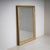 Large wall mirror in the Neoclassical Empire style, circa 1810. The rectangular frame is gilded and adorned with applied...