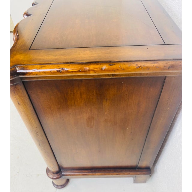 This is a vintage Walnut Chest of drawers by milling Road for the Baker furniture company. This Chest of drawers has three...