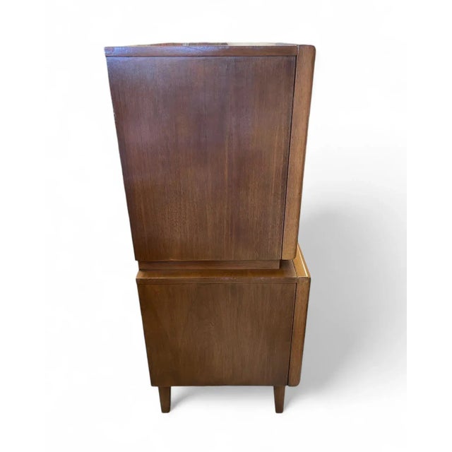 United Furniture Diamond Front Walnut Gentleman's chest This iconic Mid-Century Modern design features protruding panels...