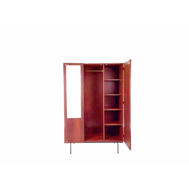 This vintage ku10 wardrobe, designed by cees braakman for pastoe , dates from 1958 and belongs to the iconic japanese...