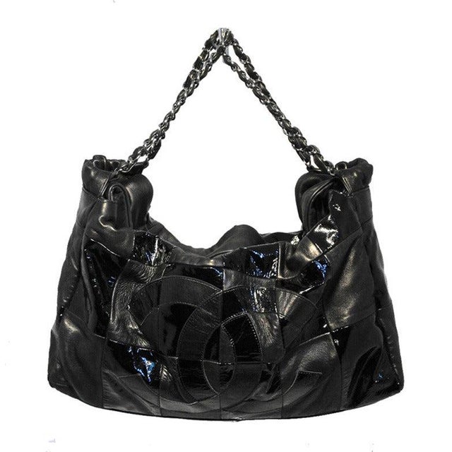 CLASSIC CHANEL black leather checkered shopping shoulder tote in excellent condition. Black lambskin and patent leather...